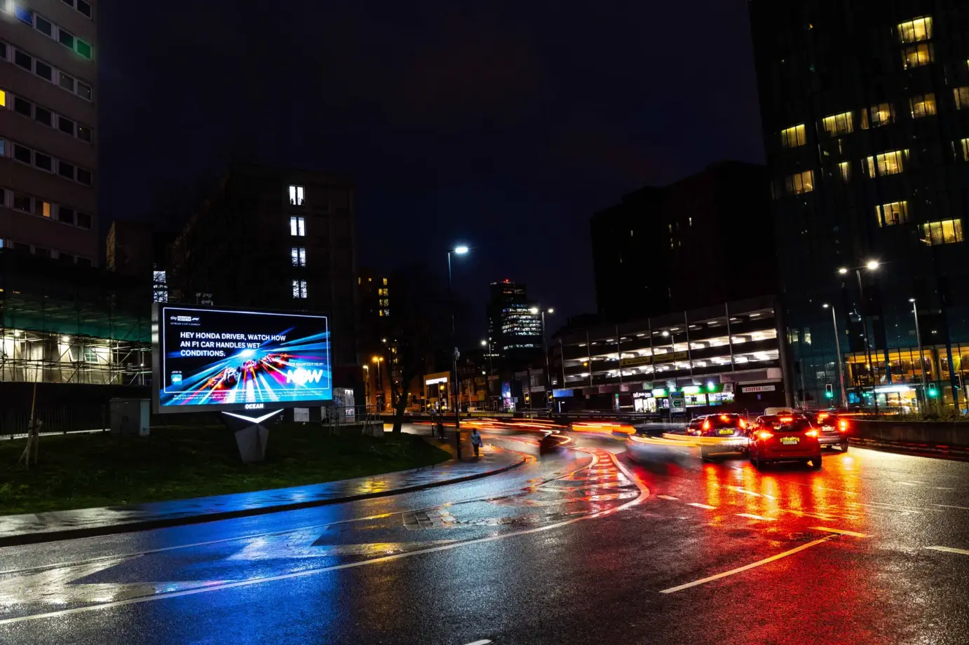 NOW Formula 1 contextual campaign on a roadside digital screen