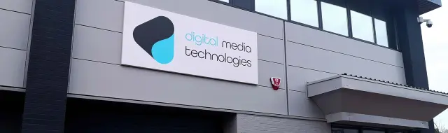 A large-scale digital environment experienced by an audience