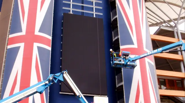 A large-format digital display operating at the AMEX Stadium