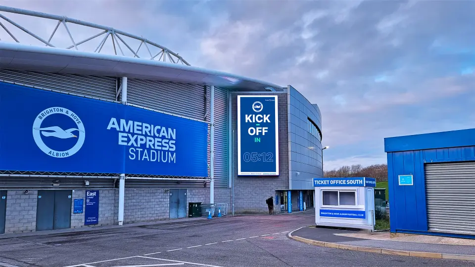 A portrait LED screen counting down to kick-off outside the American Express Stadium, home of Brighton & Hove Albion